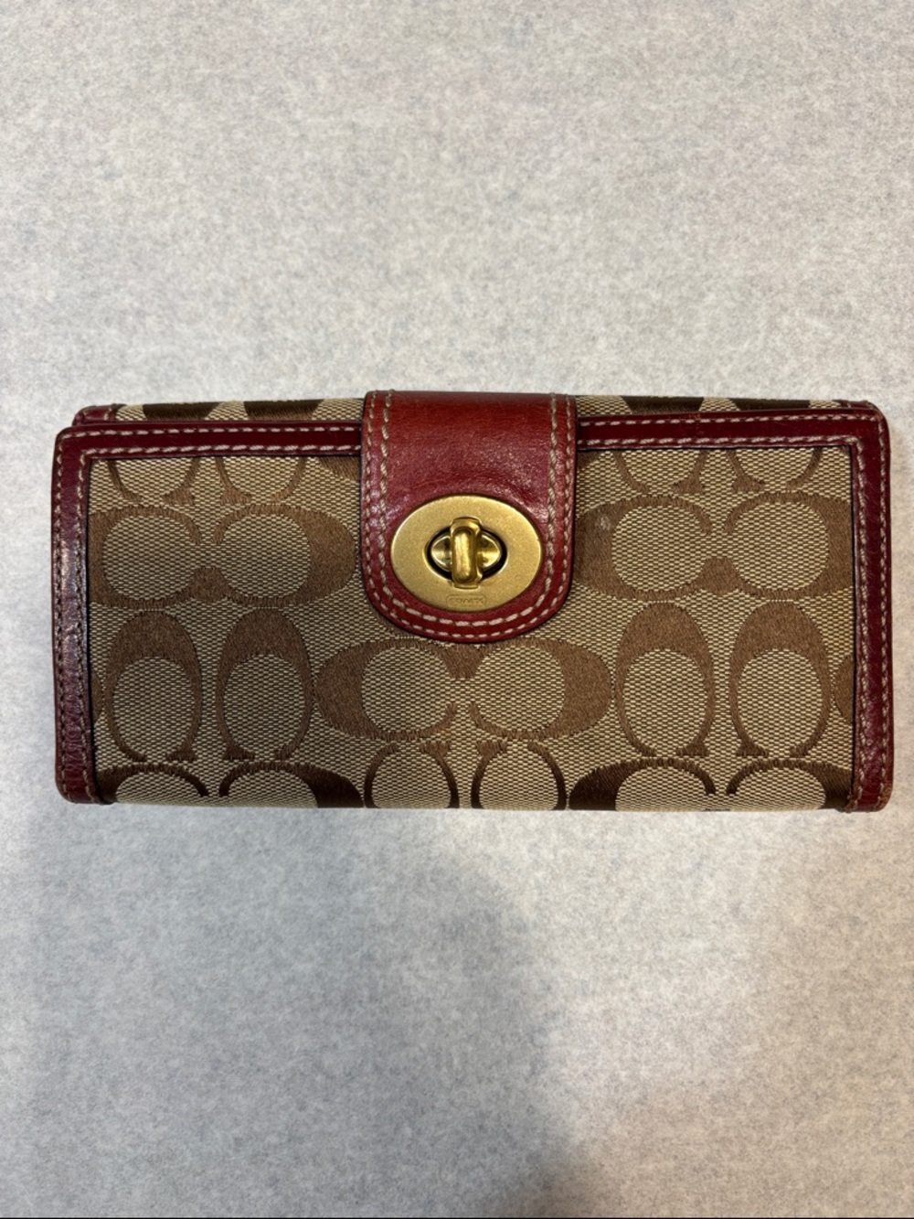 Coach Brown Signature Canvas Wallet with Burgundy Trim and Gold Turnlock